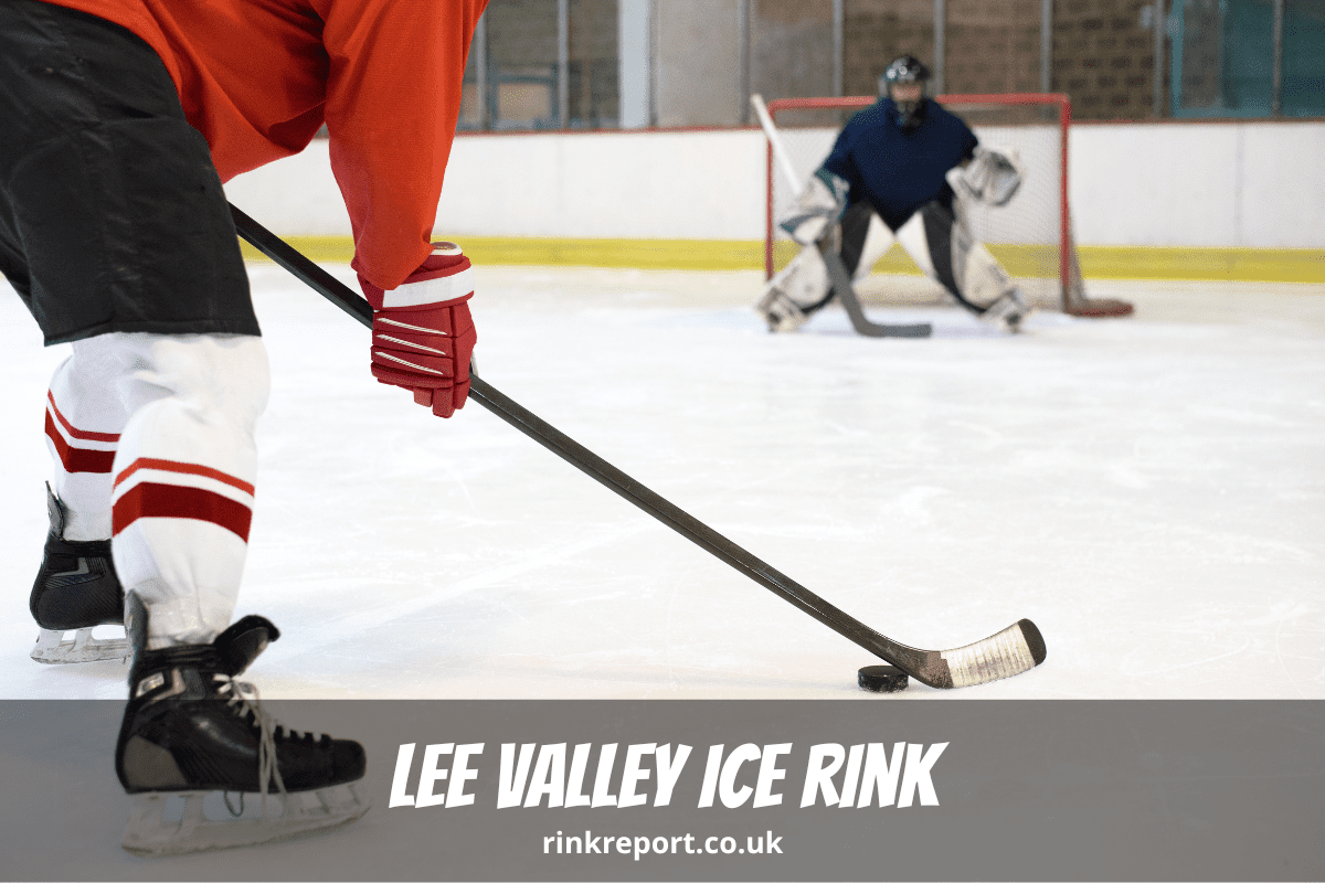 A photo of an ice hockey player about to take a shot towards a netminder defending his net as an example for lee valley ice rink also known as lee valley ice centre