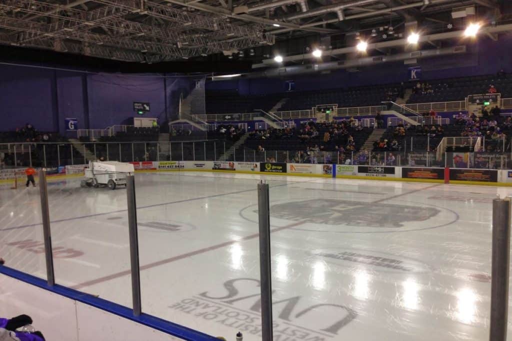 Zamboni prepares the ice for a glasgow clan ice hockey game at braehead arena ice rink scotland uk