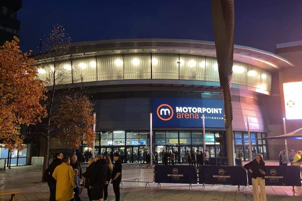 Ice hockey fans in front of nottingham ice rink motorpoint arena entrance during a break in a nottingham panthers ice hockey game