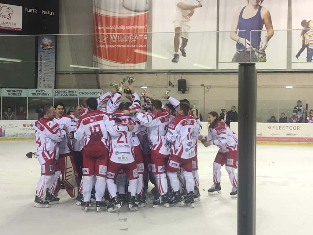 Swindon wildcats ice hockey team drink champagne to celebrate a championship win in the nihl uk ice hockey league at swindon ice rink at the link centre uk