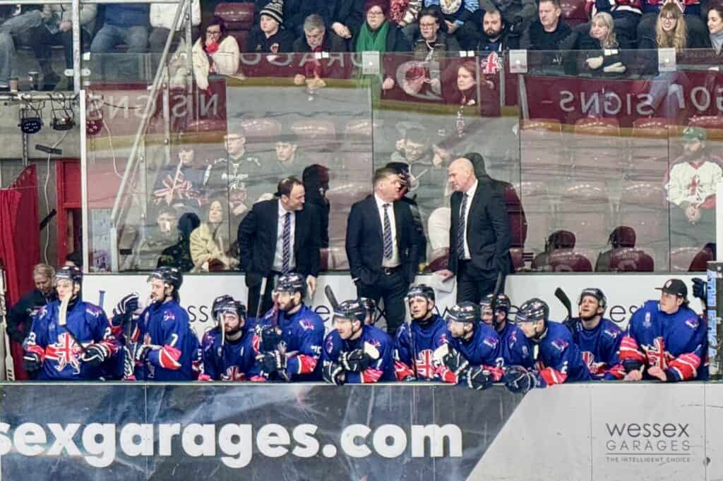 Team great britain bench at international ice hockey game at cardiff ice rink also known as ice arena wales and vindico arena
